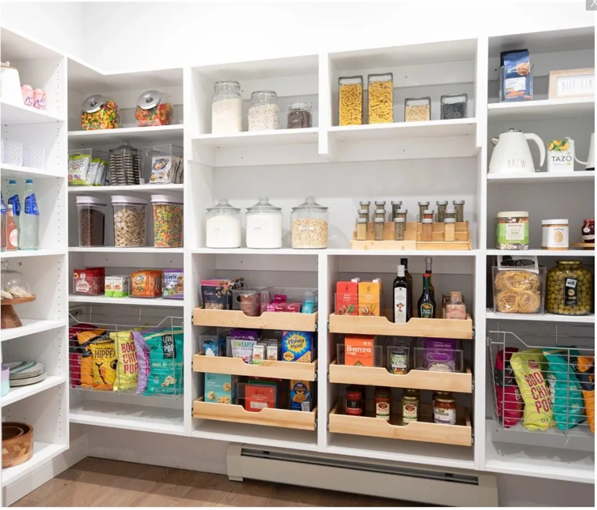 Custom pantry with pull-out organizer drawers and wire baskets