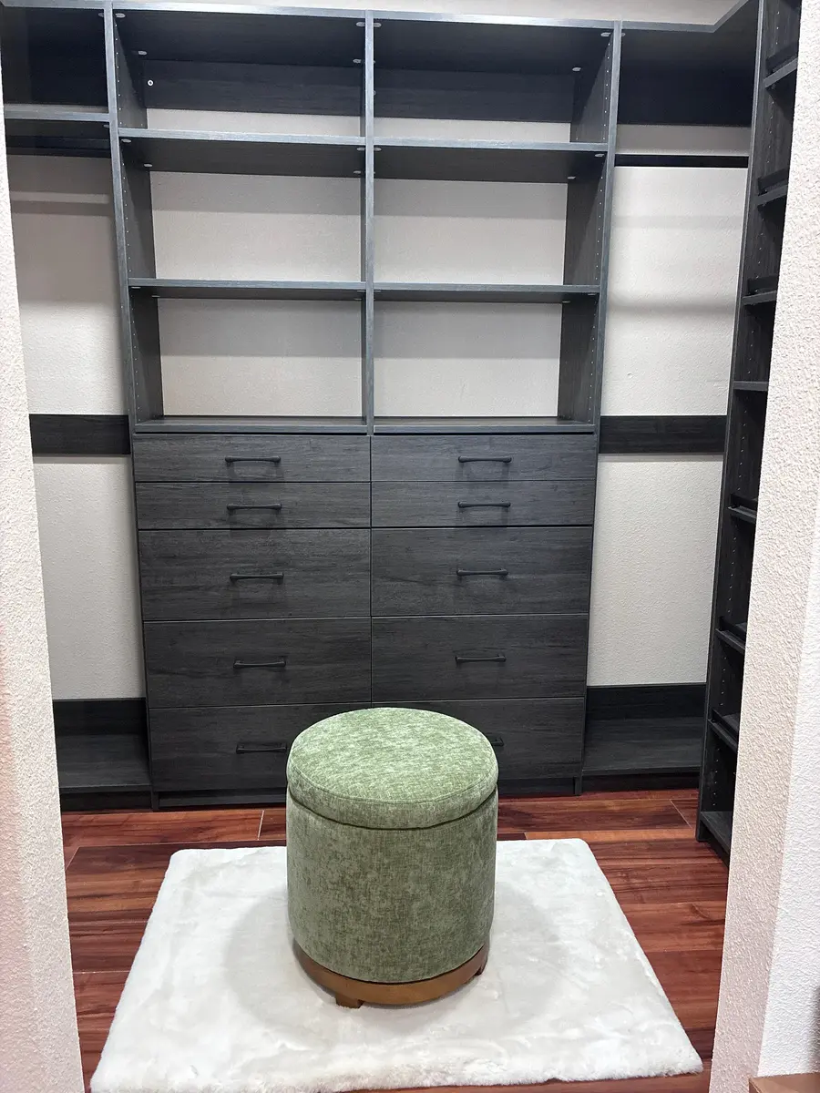 Walk-in closet with dark charcoal finish