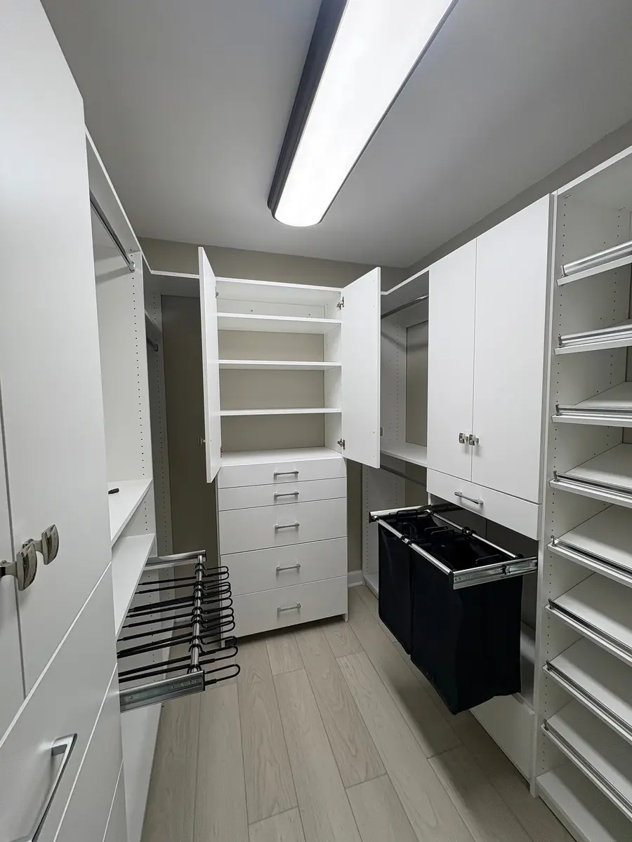 Walk-in closet with pull-out organizers