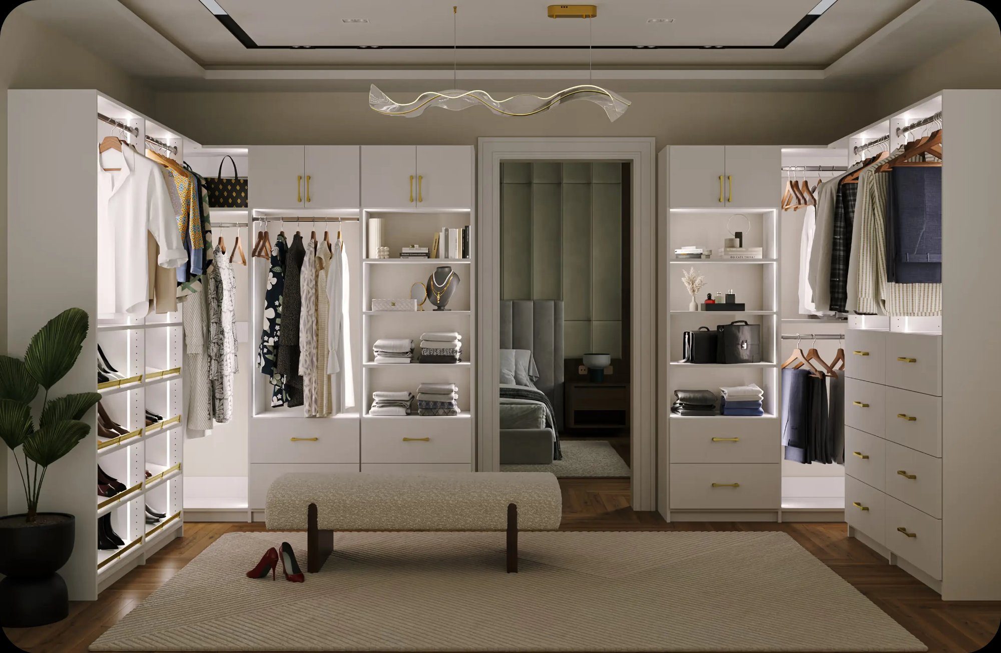 Luxury walk-in closet with white built-in shelving, LED lighting, brass hardware, and organized storage — installed by Wisconsin Custom Closets